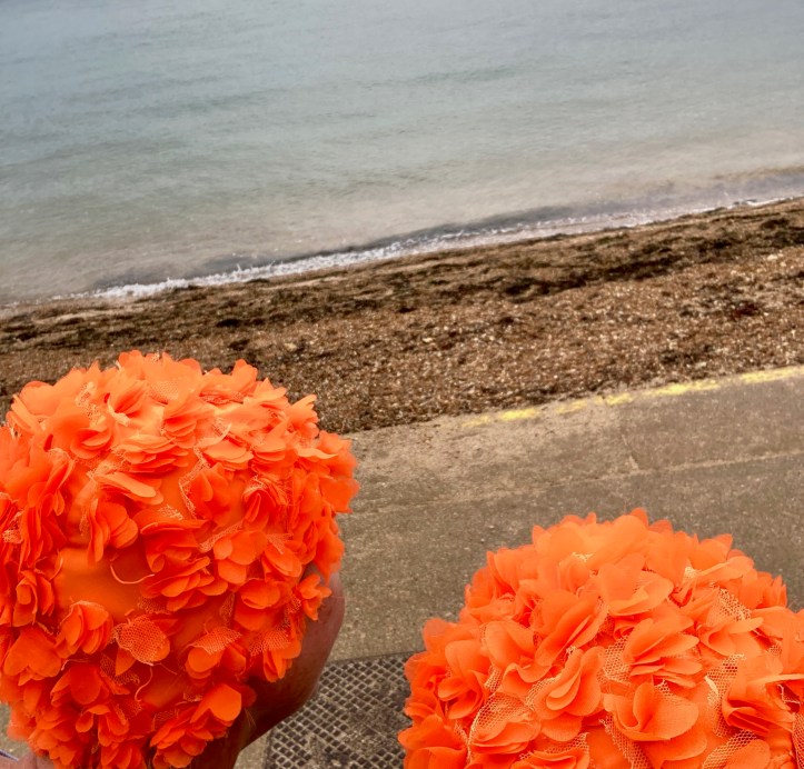 orange hat ladies, swimming women, sea swimming