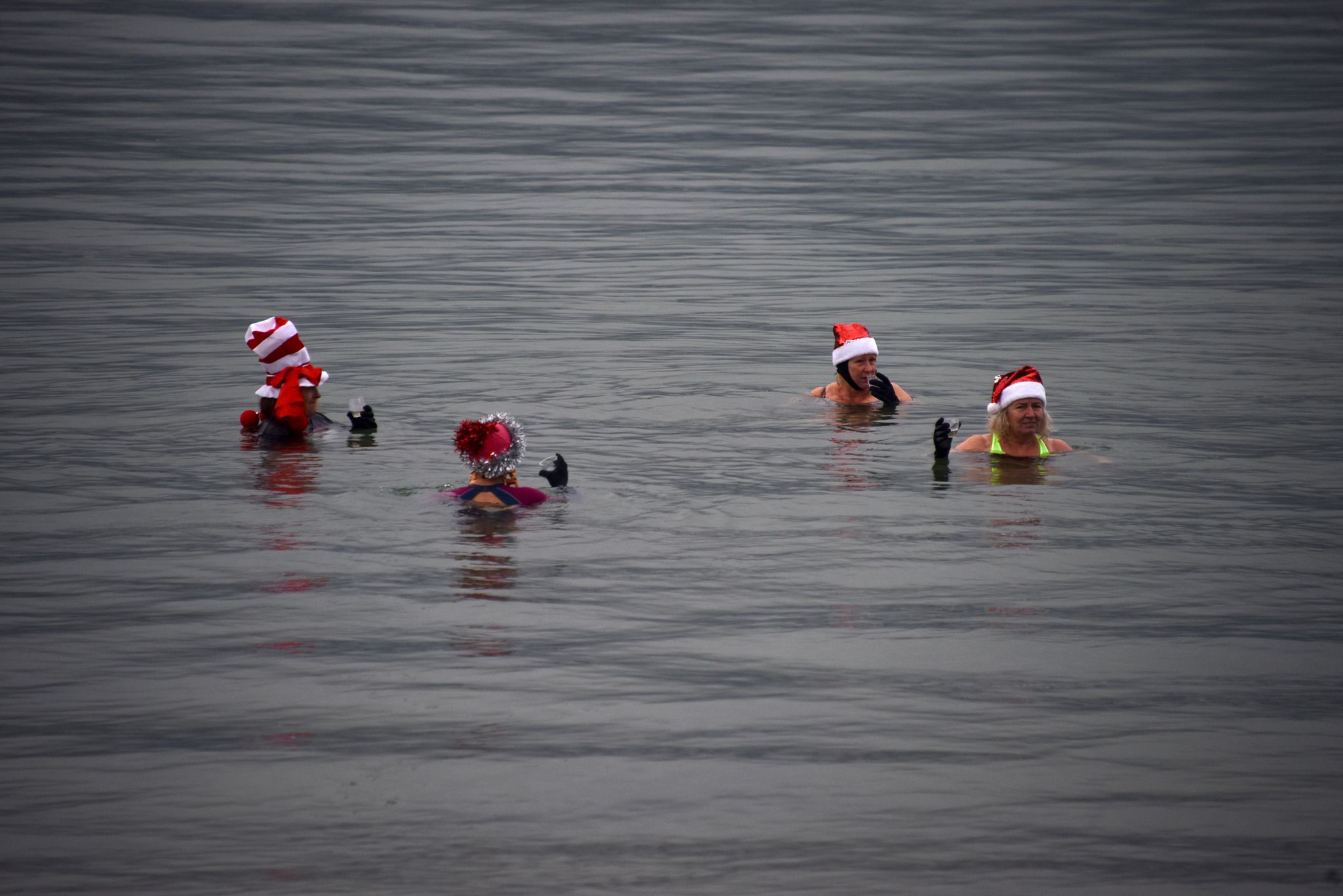 christmas day 2021, orange hat ladies, swimming women