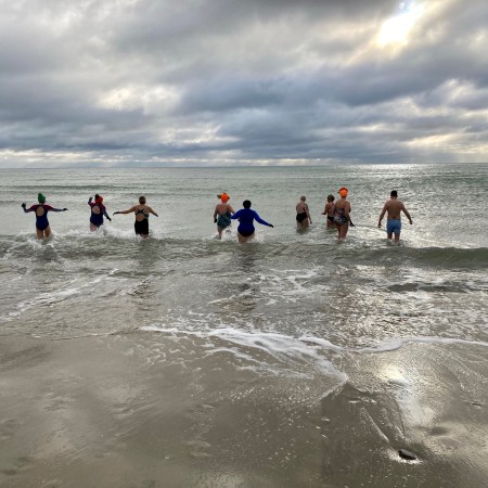 orange hat ladies, surfers against sewage, end the sewage, sea safety, protest