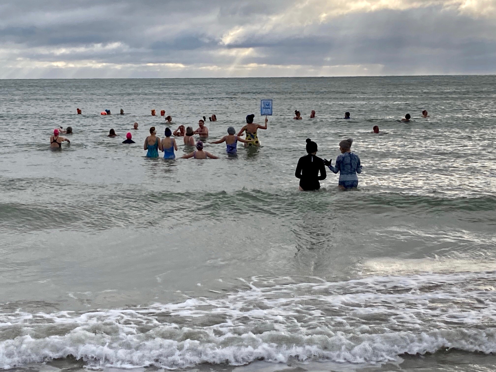 orange hat ladies, surfers against sewage, end the sewage, sea safety, protest